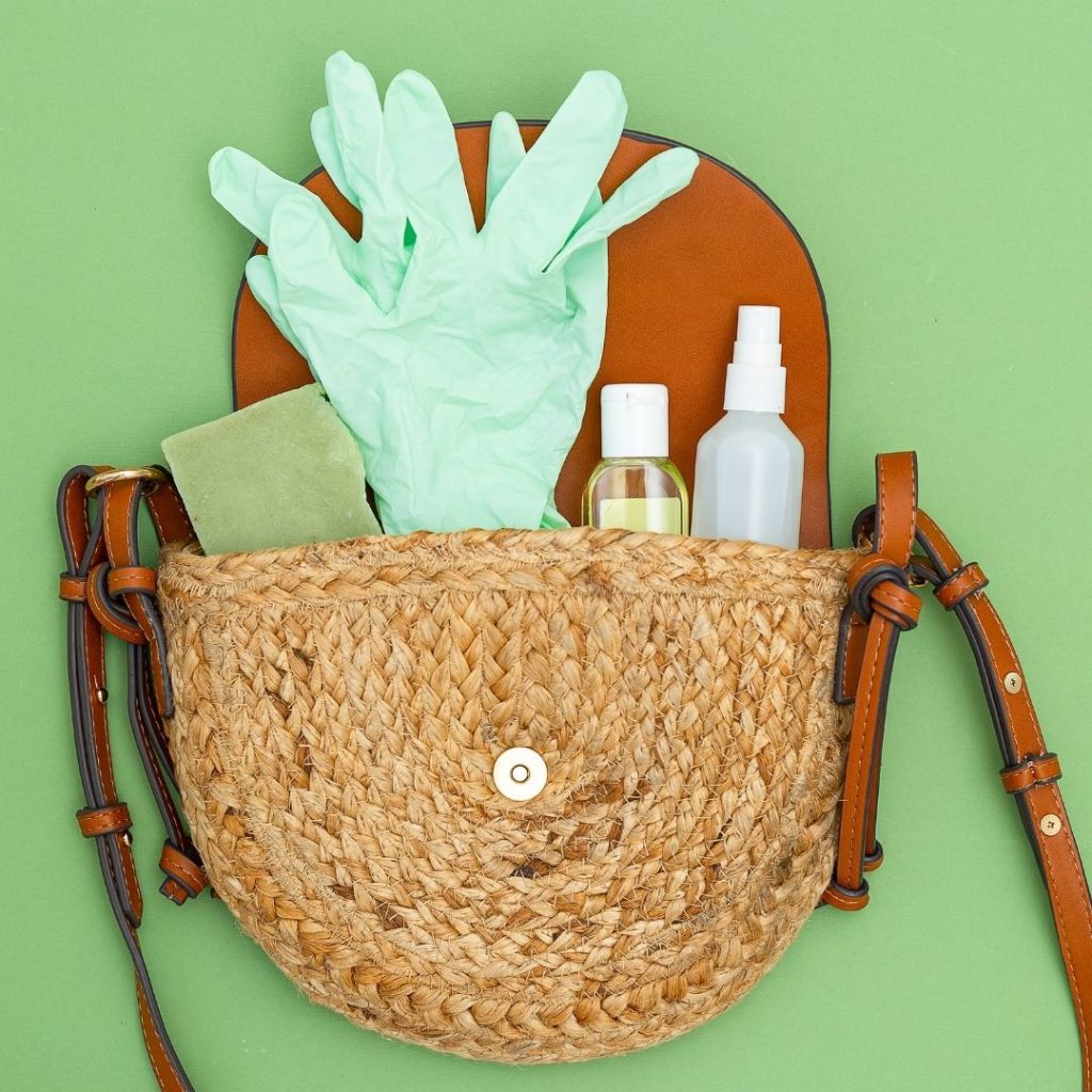 open round wicker handbag with sanitary items sticking out